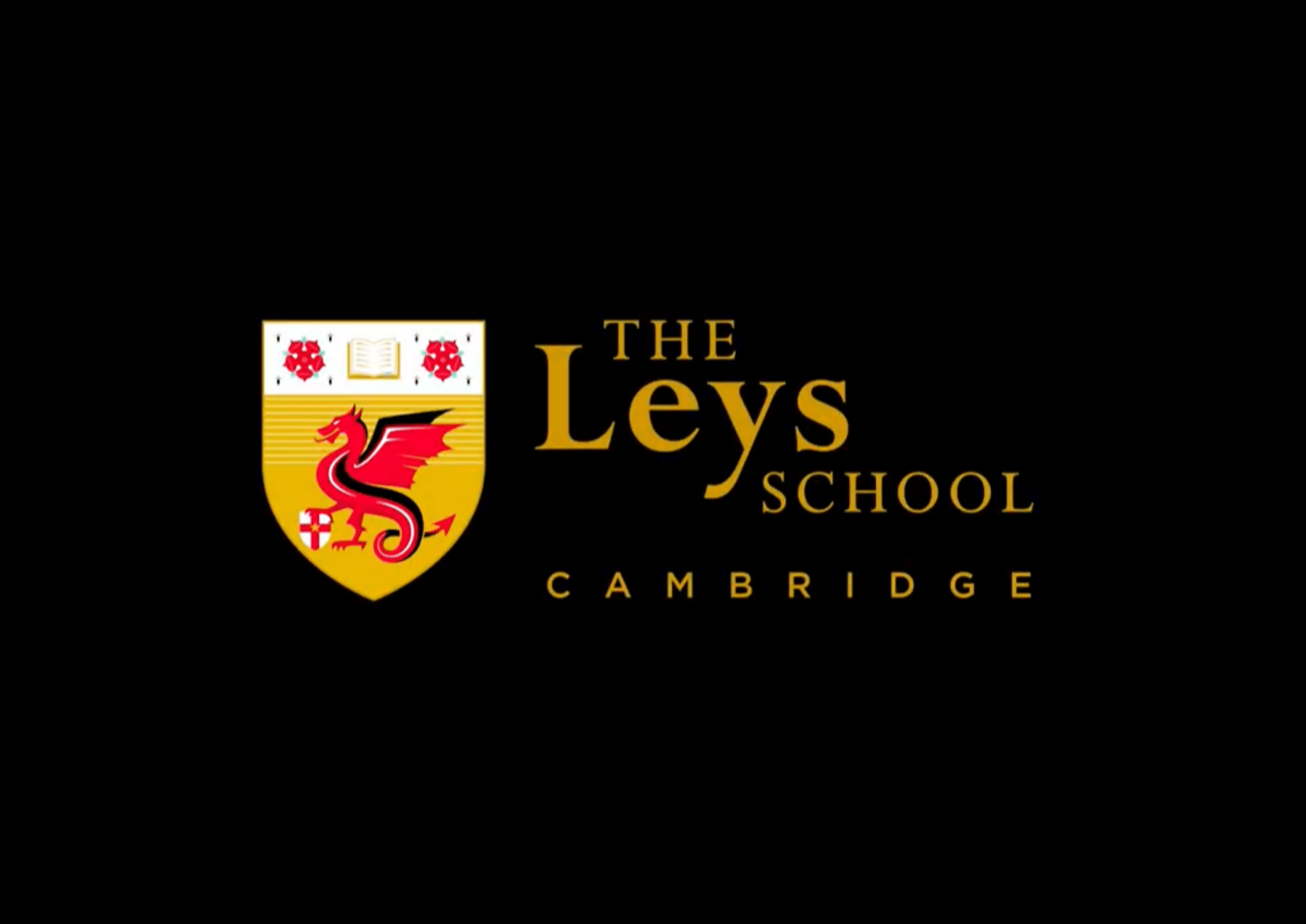 Logo of The Leys School, Cambridge, featuring a gold shield with a red dragon and an open book, next to the school name in gold text on a black background.